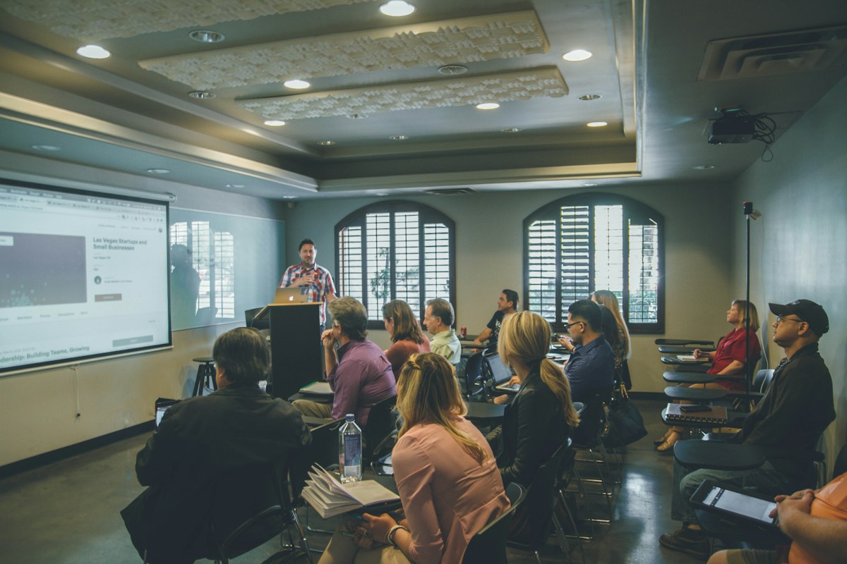 Training session with a presenter and projector screen